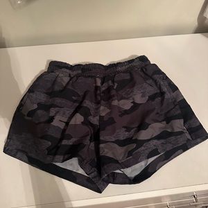 Old navy camo shorts with built in underwear. Size large children (10-12)